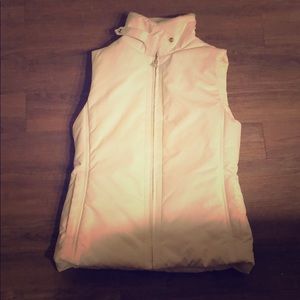 White faux fur lined vest